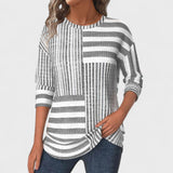 Emília - Blusa riscada de material respirável