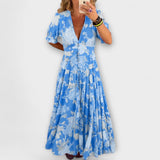 Catrisa - Vestido com padrão floral e decote em V com bolsos