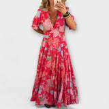 Catrisa - Vestido com padrão floral e decote em V com bolsos