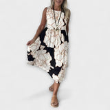 Vestido midi floral com saia de volantes