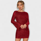 Vestido sem costas com lantejoulas e mangas longas